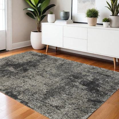 4' X 6' Black and Gray Abstract Shag Power Loom Area Rug