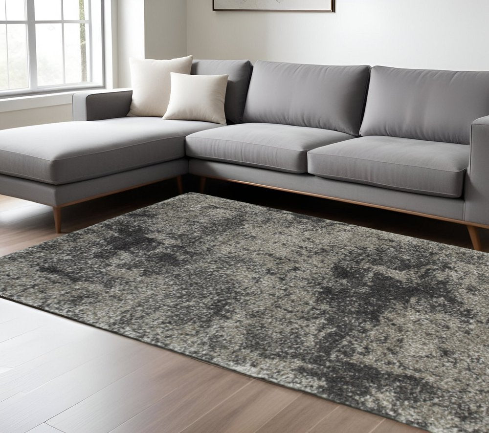 8' X 11' Charcoal Silver And Grey Abstract Shag Power Loom Stain Resistant Area Rug