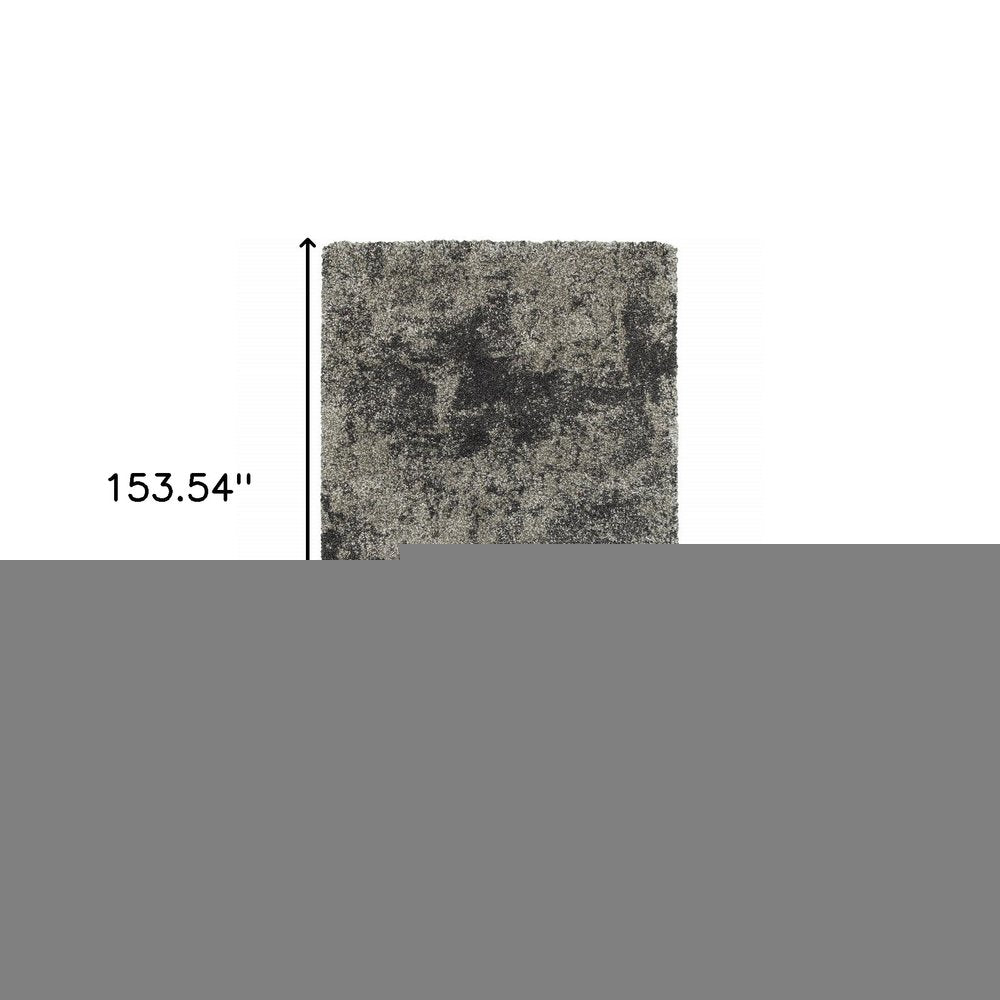10' X 13' Charcoal Silver And Grey Abstract Shag Power Loom Stain Resistant Area Rug