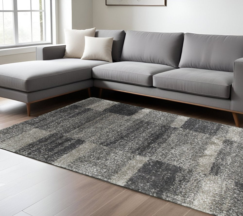 6' X 9' Charcoal Silver And Grey Geometric Shag Power Loom Stain Resistant Area Rug