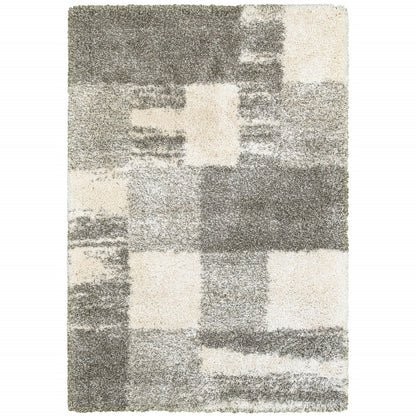 5' X 8' Gray And Ivory Abstract Geometric Shag Area Rug