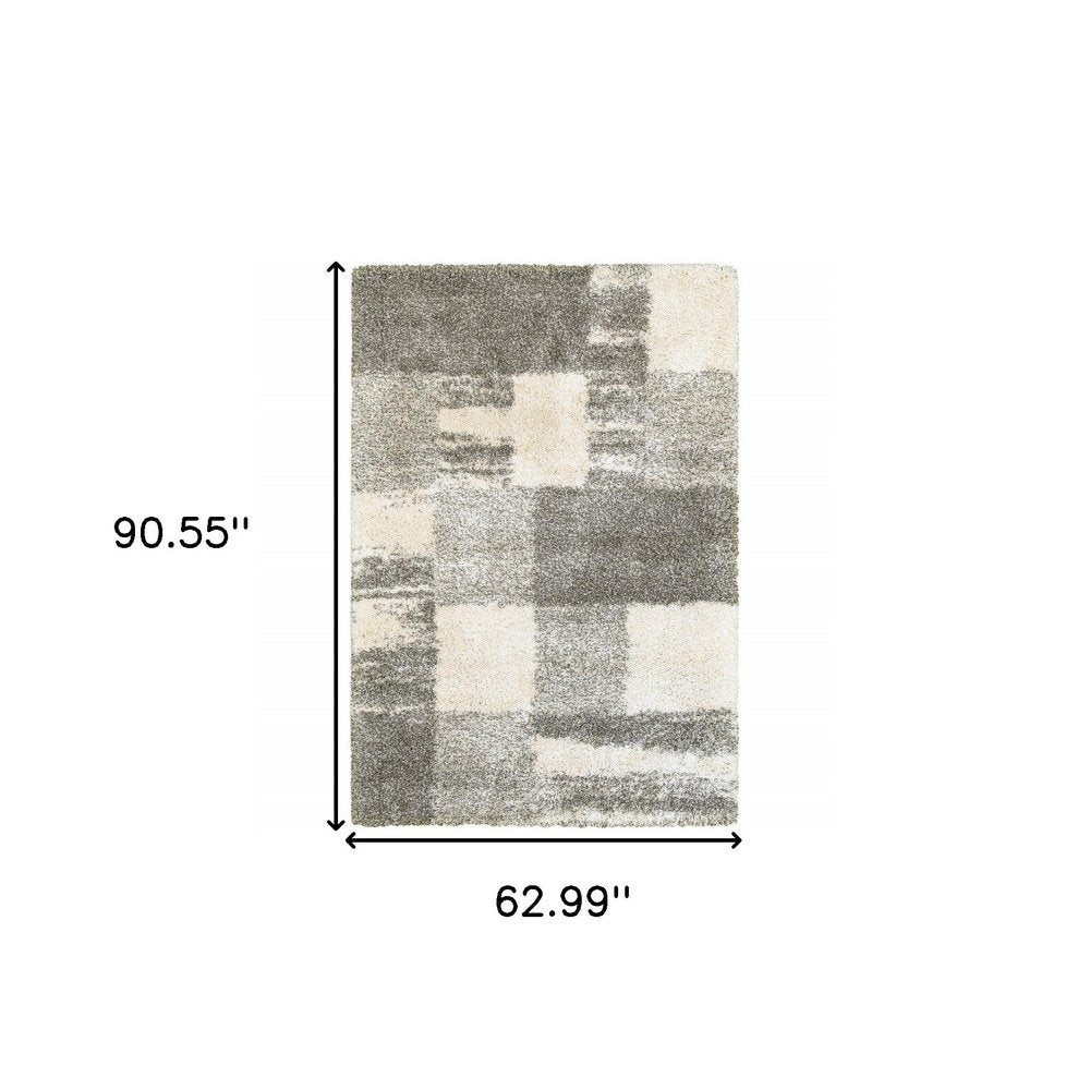 5' X 8' Gray And Ivory Abstract Geometric Shag Area Rug