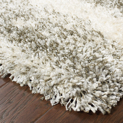 6' X 9' Grey Ivory And Silver Geometric Shag Power Loom Stain Resistant Area Rug