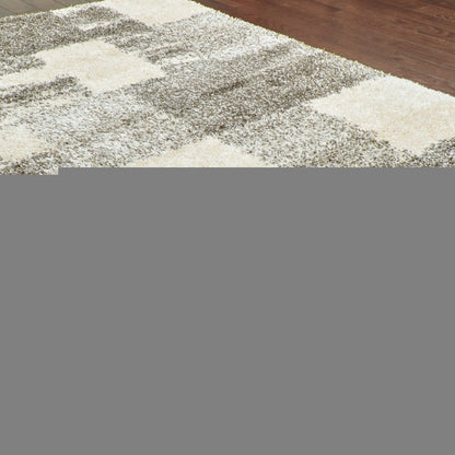 8' X 11' Grey Ivory And Silver Geometric Shag Power Loom Stain Resistant Area Rug