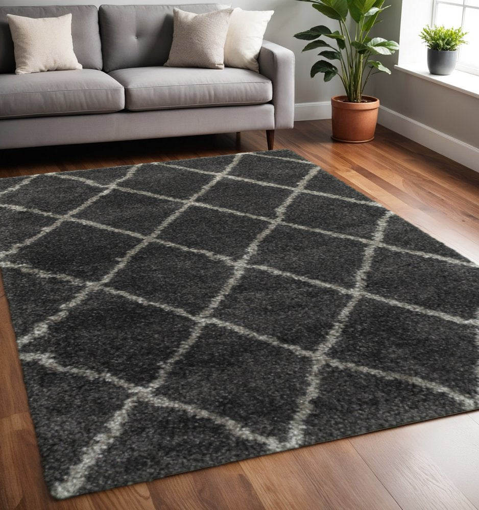 5' X 8' Charcoal And Grey Geometric Shag Power Loom Stain Resistant Area Rug