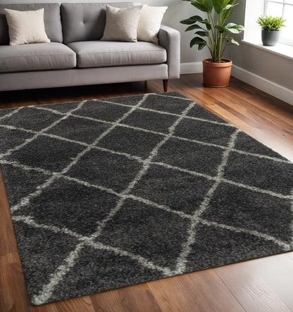 5' X 8' Charcoal And Grey Geometric Shag Power Loom Stain Resistant Area Rug