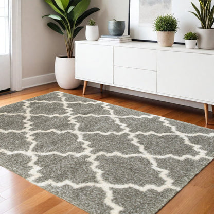 4' X 6' Grey And Ivory Geometric Shag Power Loom Stain Resistant Area Rug