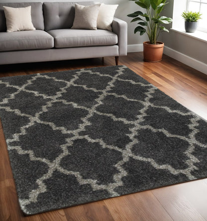 5' X 8' Charcoal And Grey Geometric Shag Power Loom Stain Resistant Area Rug