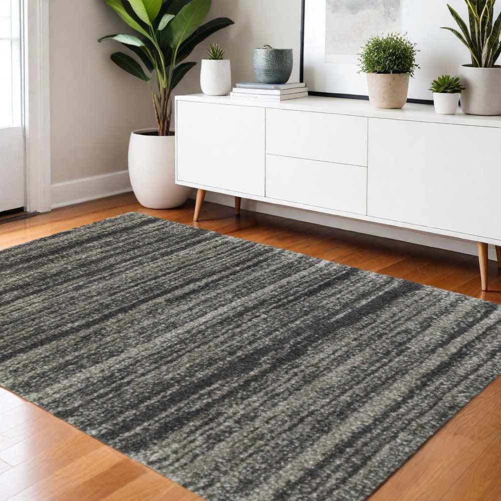 4' X 6' Charcoal Silver And Grey Geometric Shag Power Loom Stain Resistant Area Rug
