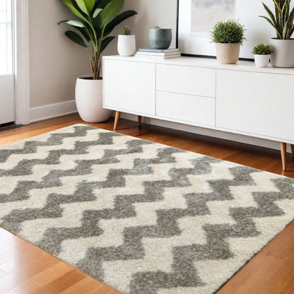 4' X 6' Grey And Ivory Geometric Shag Power Loom Stain Resistant Area Rug