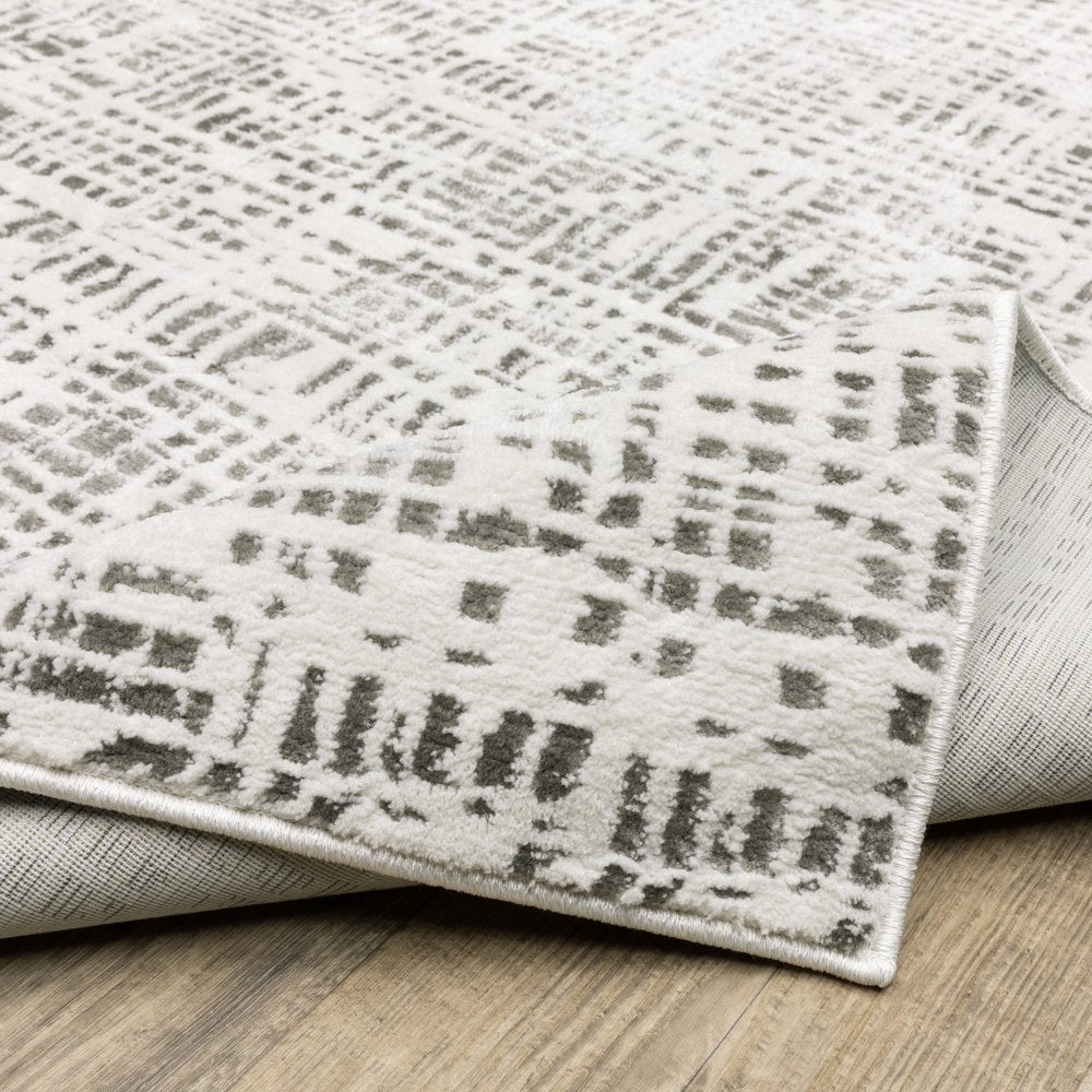 3' X 5' White And Grey Abstract Power Loom Stain Resistant Area Rug