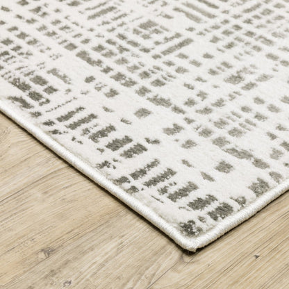 5' X 8' White And Grey Abstract Power Loom Stain Resistant Area Rug