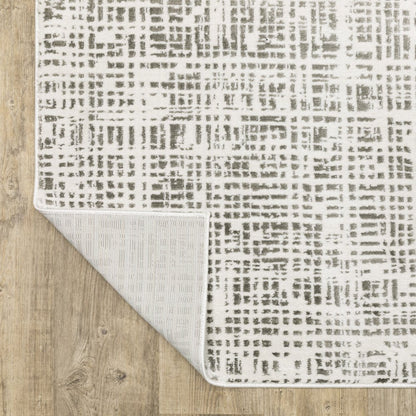 5' X 8' White And Grey Abstract Power Loom Stain Resistant Area Rug
