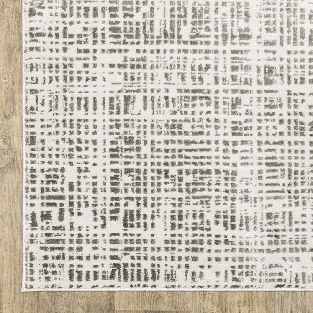 5' X 8' White And Grey Abstract Power Loom Stain Resistant Area Rug
