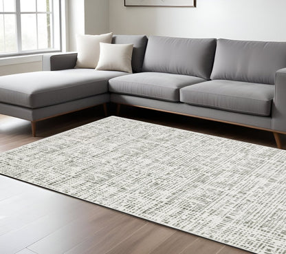7' X 10' White And Gray Abstract Distressed Area Rug