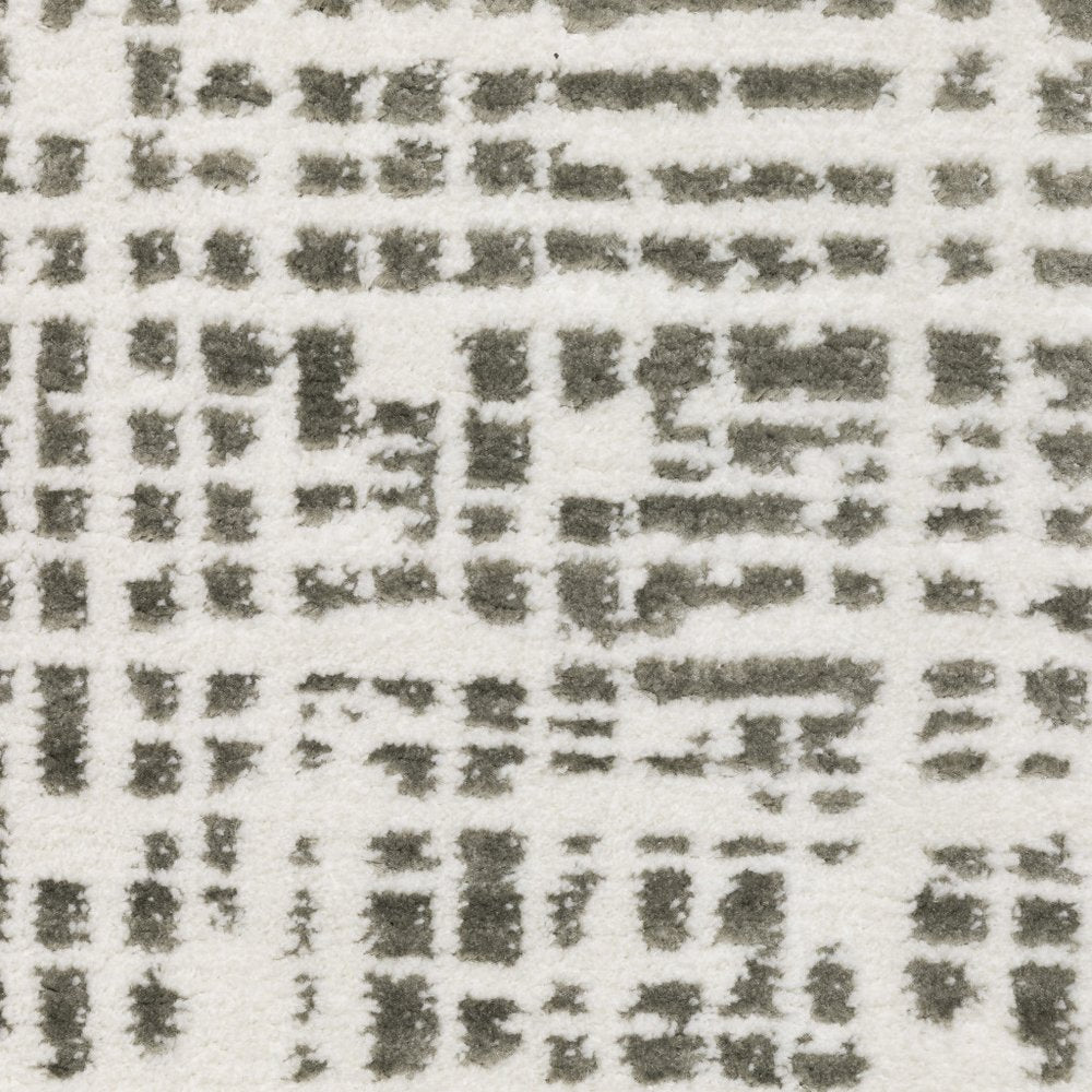 7' X 10' White And Gray Abstract Distressed Area Rug