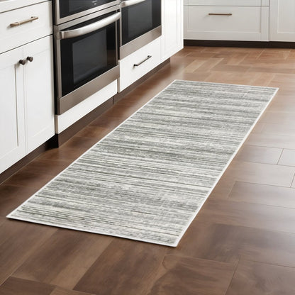 2' X 8' White And Grey Abstract Power Loom Stain Resistant Runner Rug
