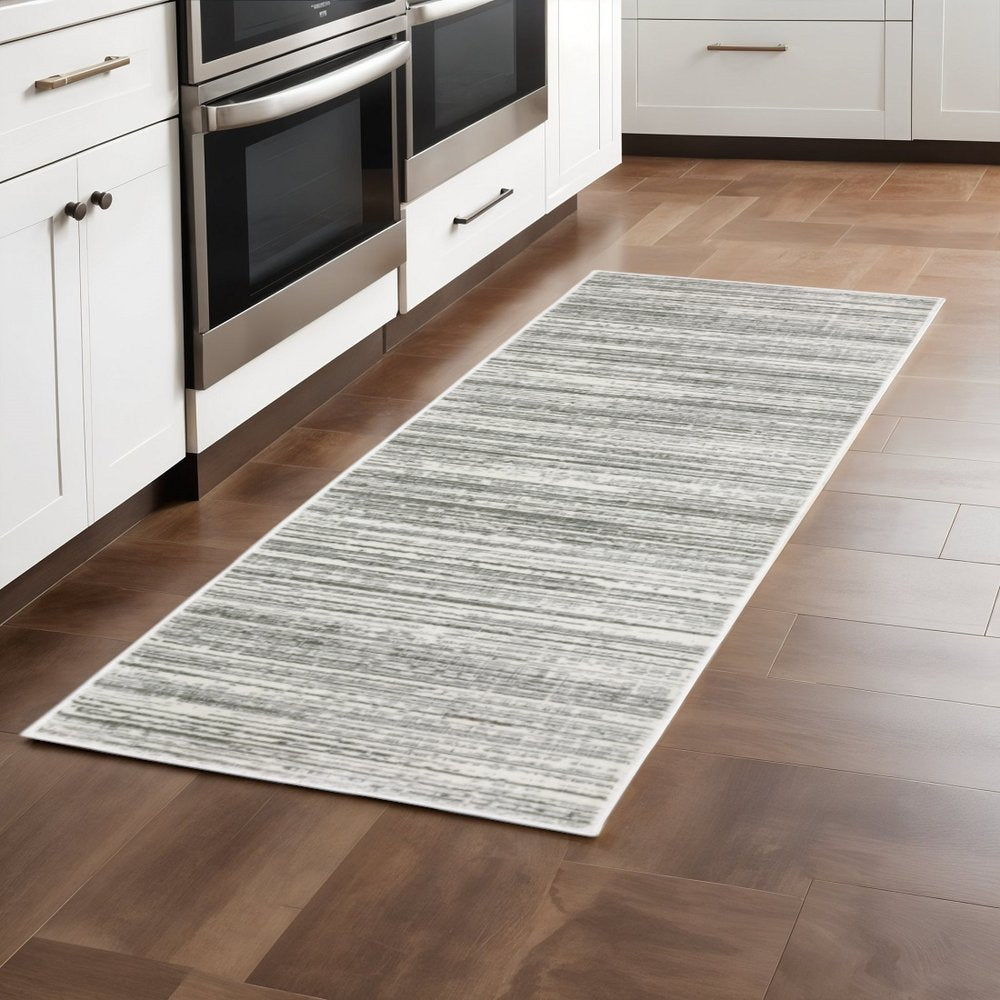 2' X 8' White And Grey Abstract Power Loom Stain Resistant Runner Rug