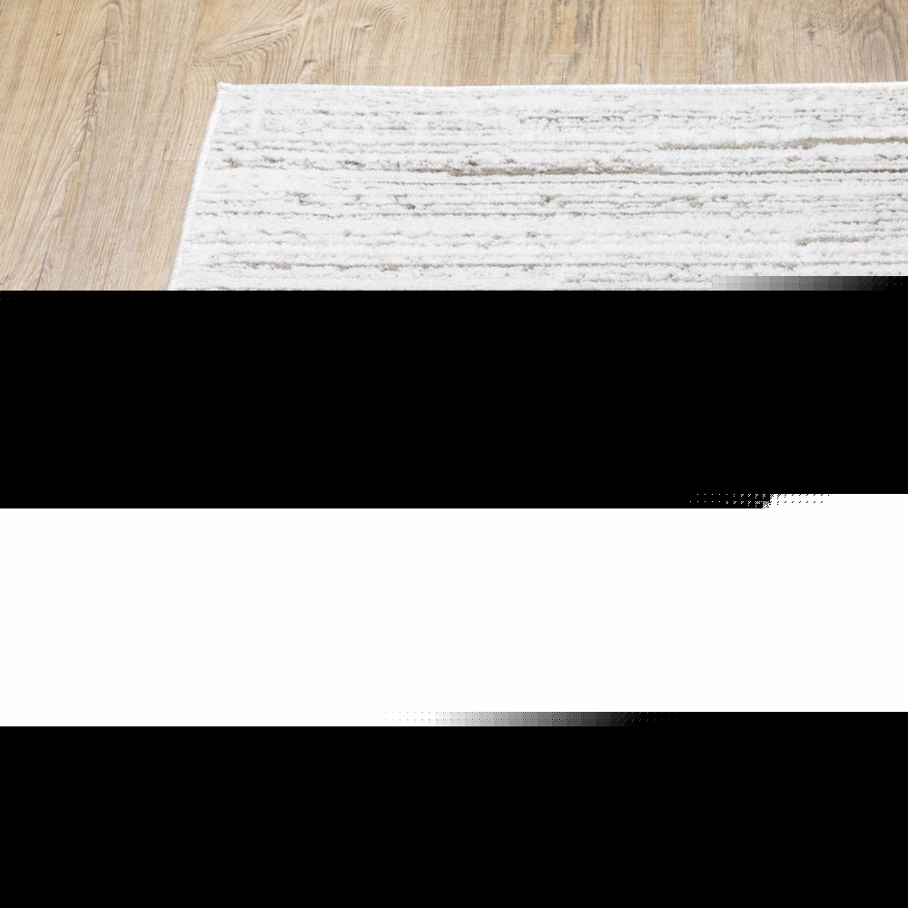 2' X 8' White And Grey Abstract Power Loom Stain Resistant Runner Rug