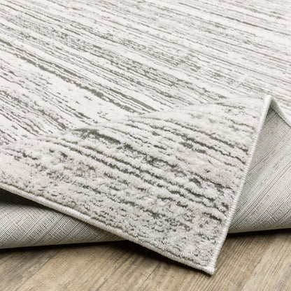 2' X 8' White And Grey Abstract Power Loom Stain Resistant Runner Rug