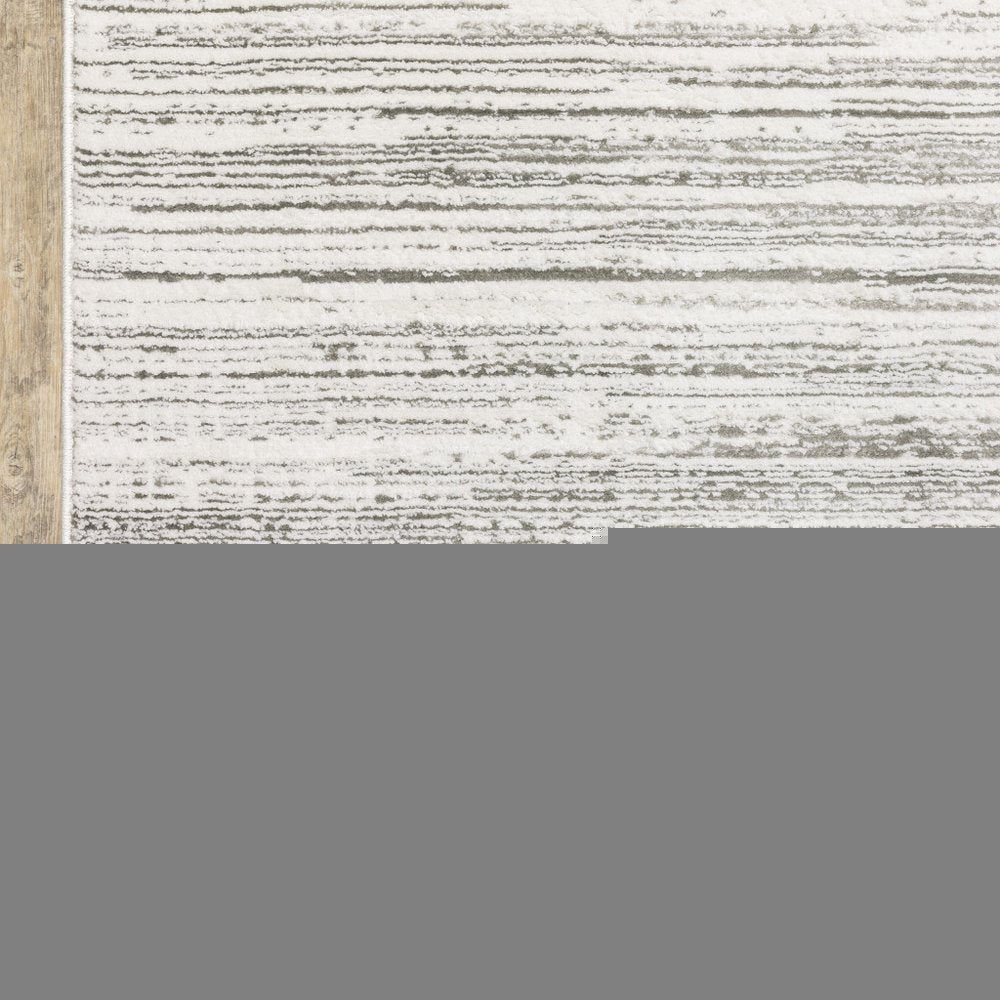 3' X 5' White And Grey Abstract Power Loom Stain Resistant Area Rug