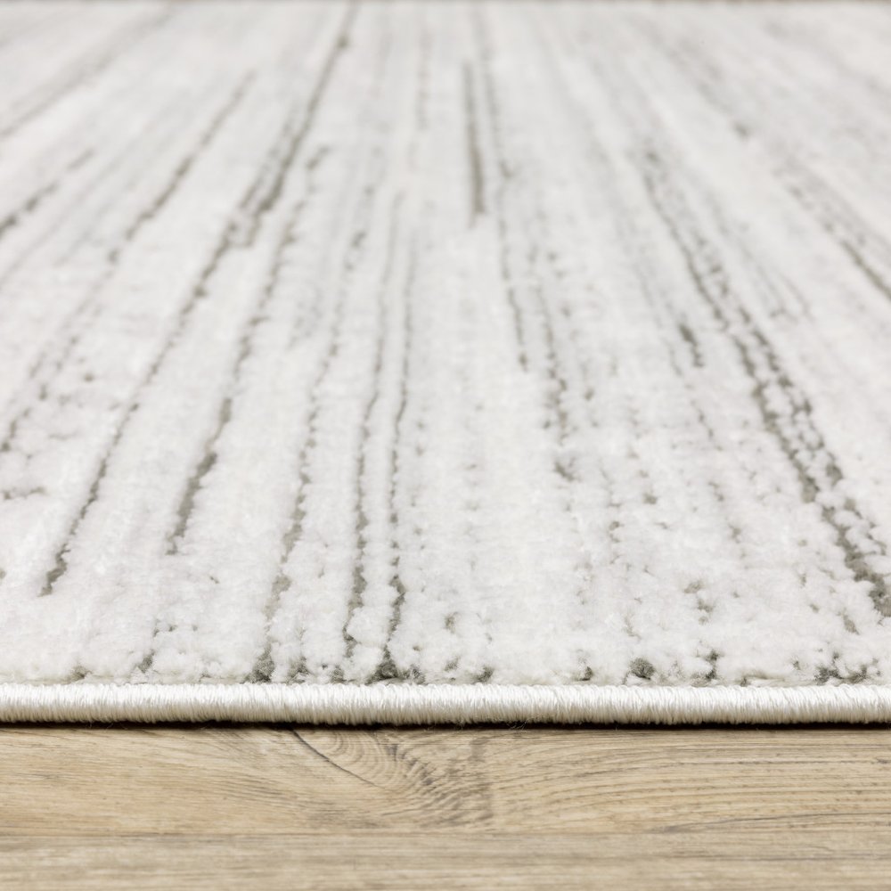 8' X 11' White And Gray Abstract Distressed Area Rug