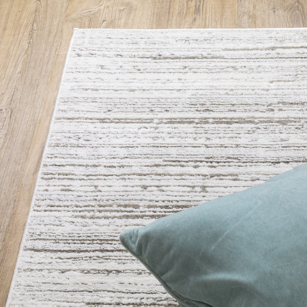 8' X 11' White And Gray Abstract Distressed Area Rug
