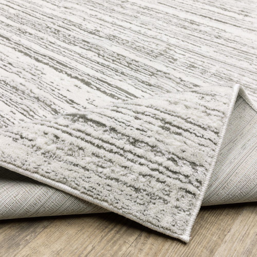 8' X 11' White And Gray Abstract Distressed Area Rug