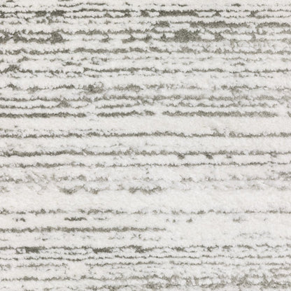 8' X 11' White And Gray Abstract Distressed Area Rug