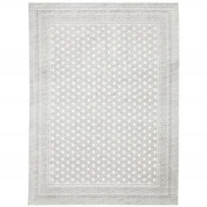 7' X 10' White And Gray Oriental Distressed Area Rug