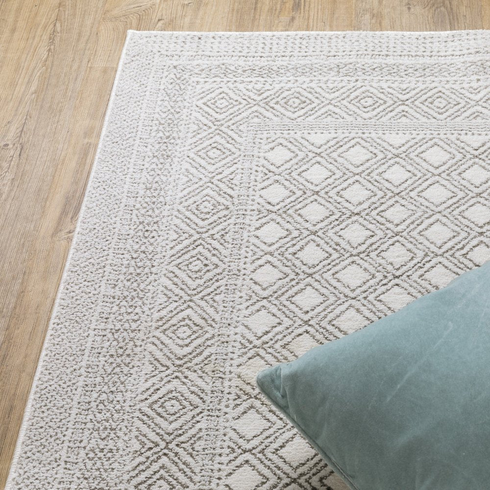 7' X 10' White And Gray Oriental Distressed Area Rug