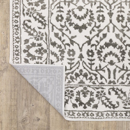 5' X 8' Grey And White Floral Power Loom Stain Resistant Area Rug