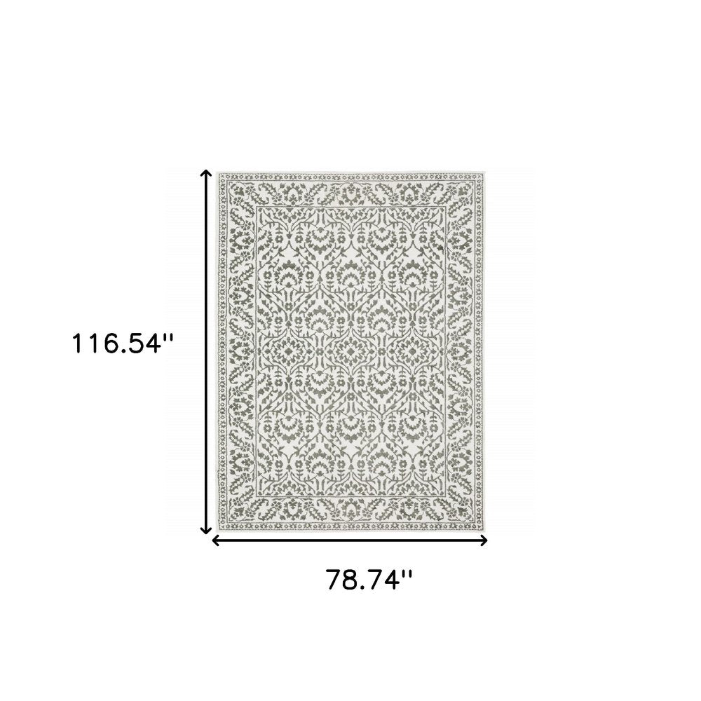 7' X 10' Gray And White Floral Distressed Area Rug