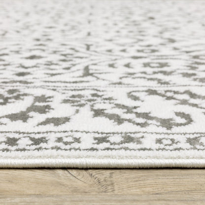 8' X 11' Gray And White Floral Distressed Area Rug