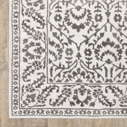 8' X 11' Gray And White Floral Distressed Area Rug