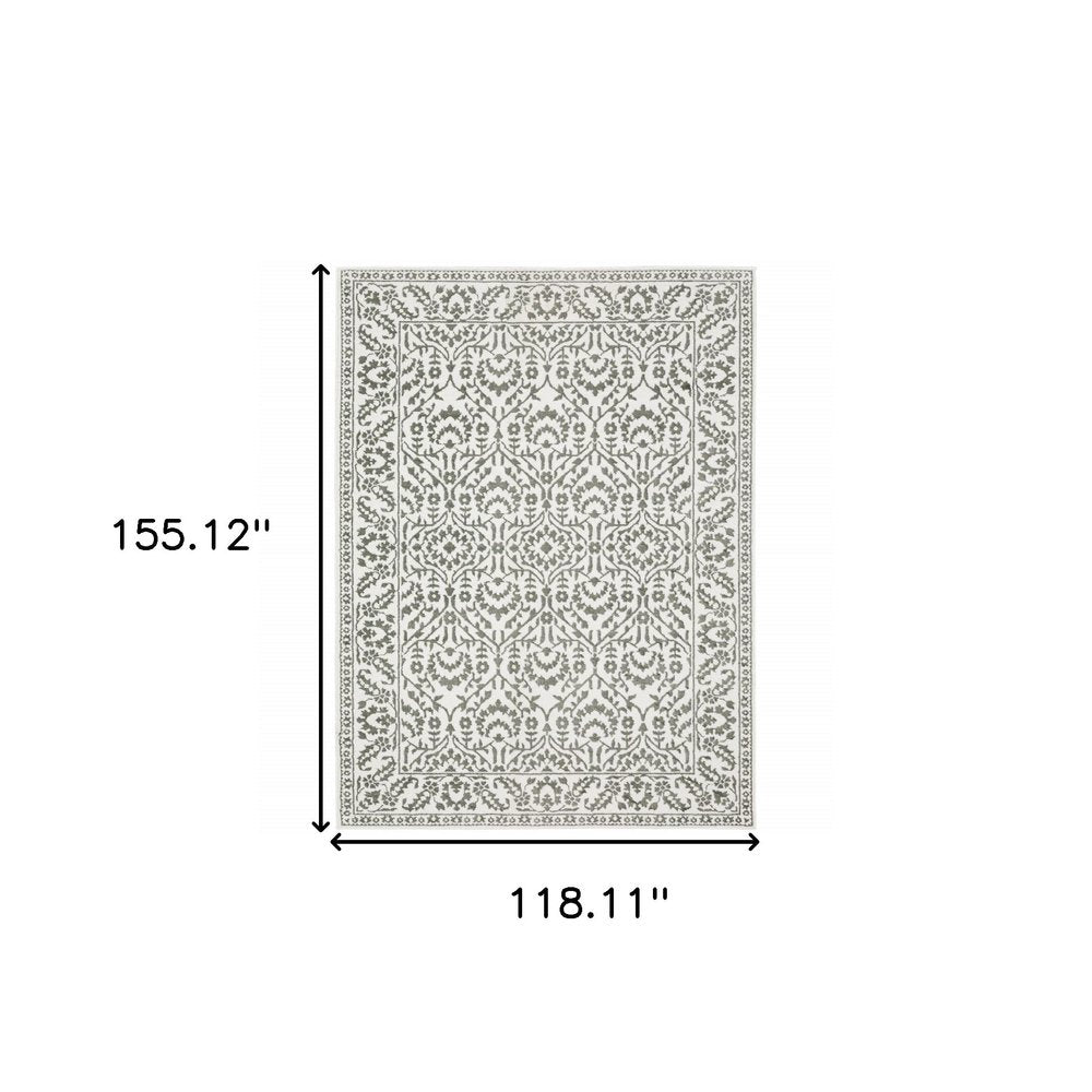10' X 13' Grey And White Floral Power Loom Stain Resistant Area Rug