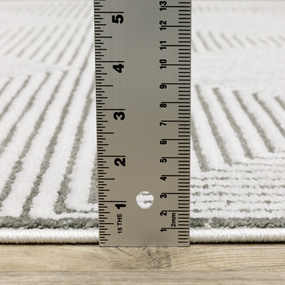 2' X 8' Grey And White Geometric Power Loom Stain Resistant Runner Rug