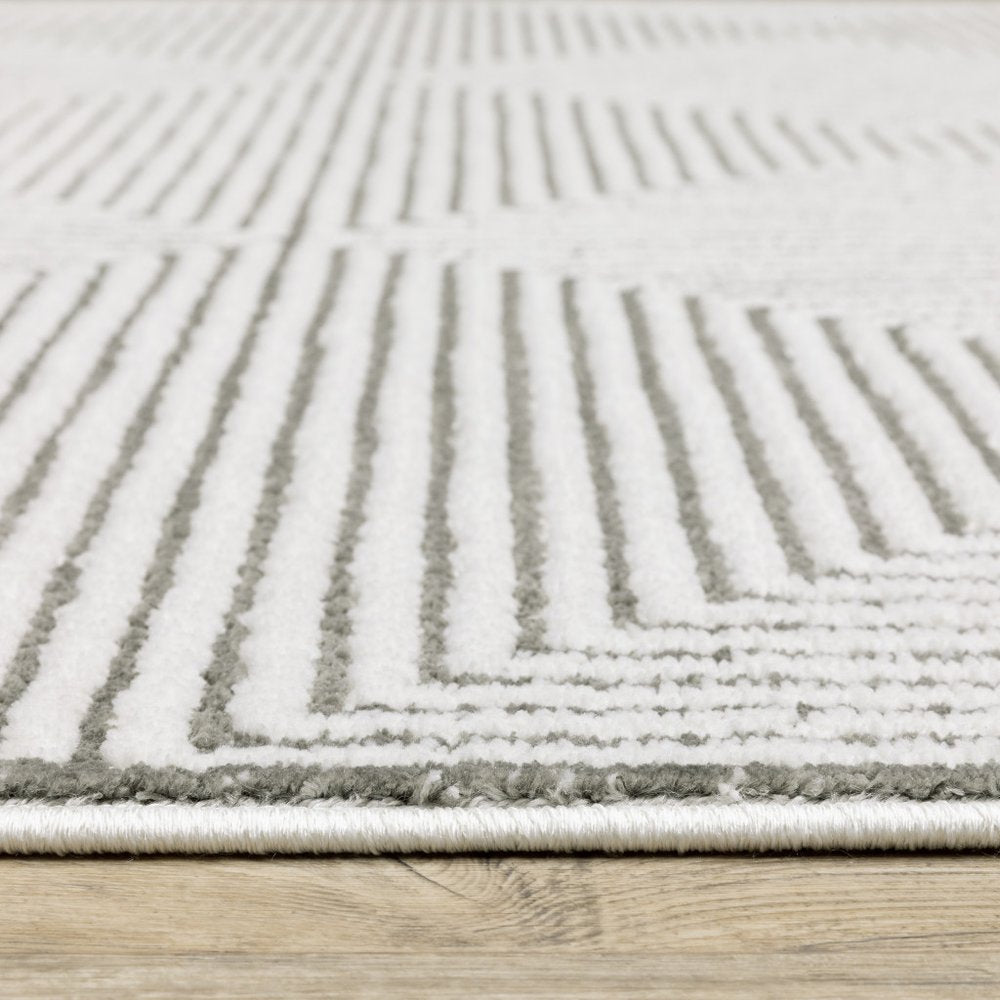 5' X 8' Grey And White Geometric Power Loom Stain Resistant Area Rug