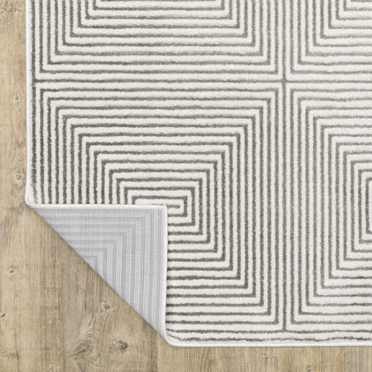 5' X 8' Grey And White Geometric Power Loom Stain Resistant Area Rug