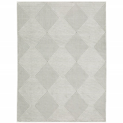7' X 10' Gray And White Geometric Distressed Area Rug