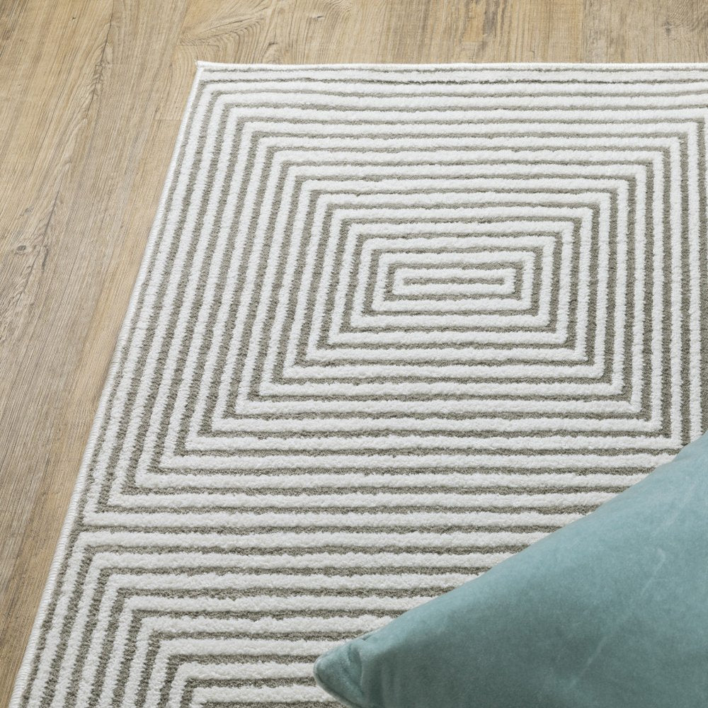 7' X 10' Gray And White Geometric Distressed Area Rug