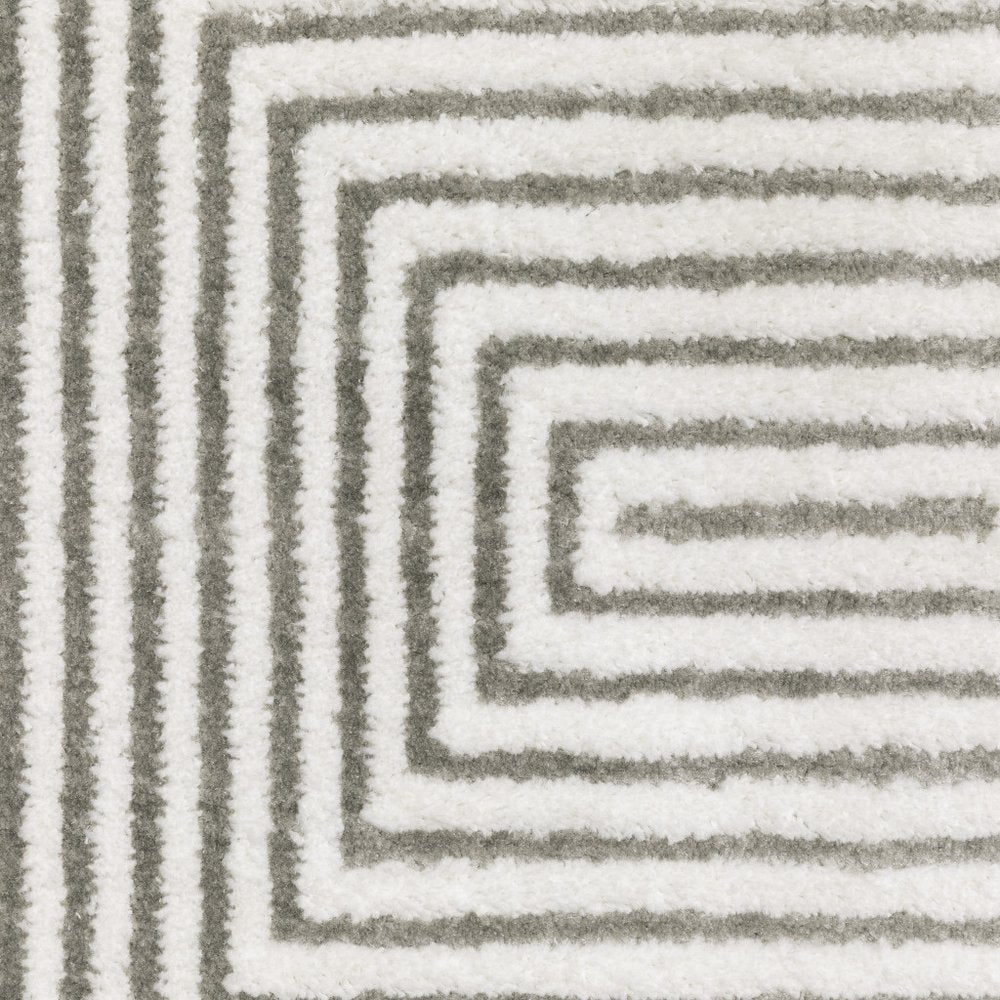 7' X 10' Gray And White Geometric Distressed Area Rug