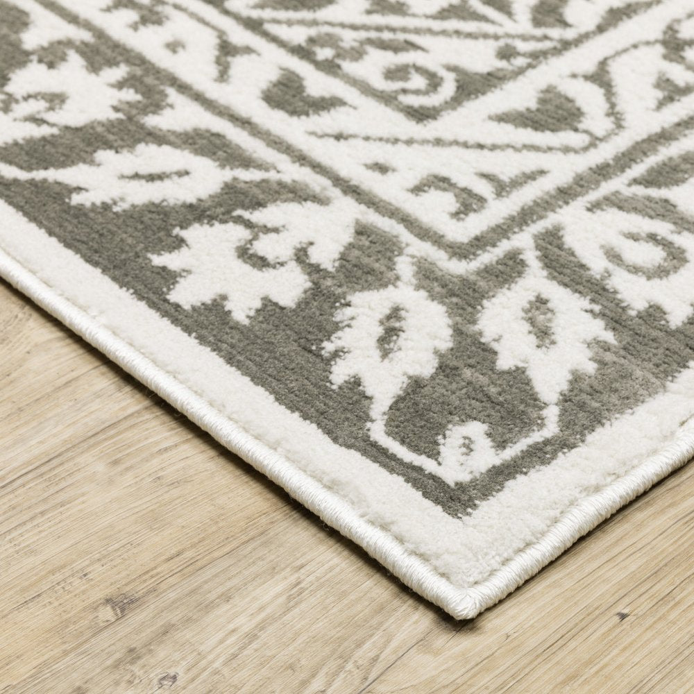 7' X 10' Gray And White Oriental Distressed Area Rug