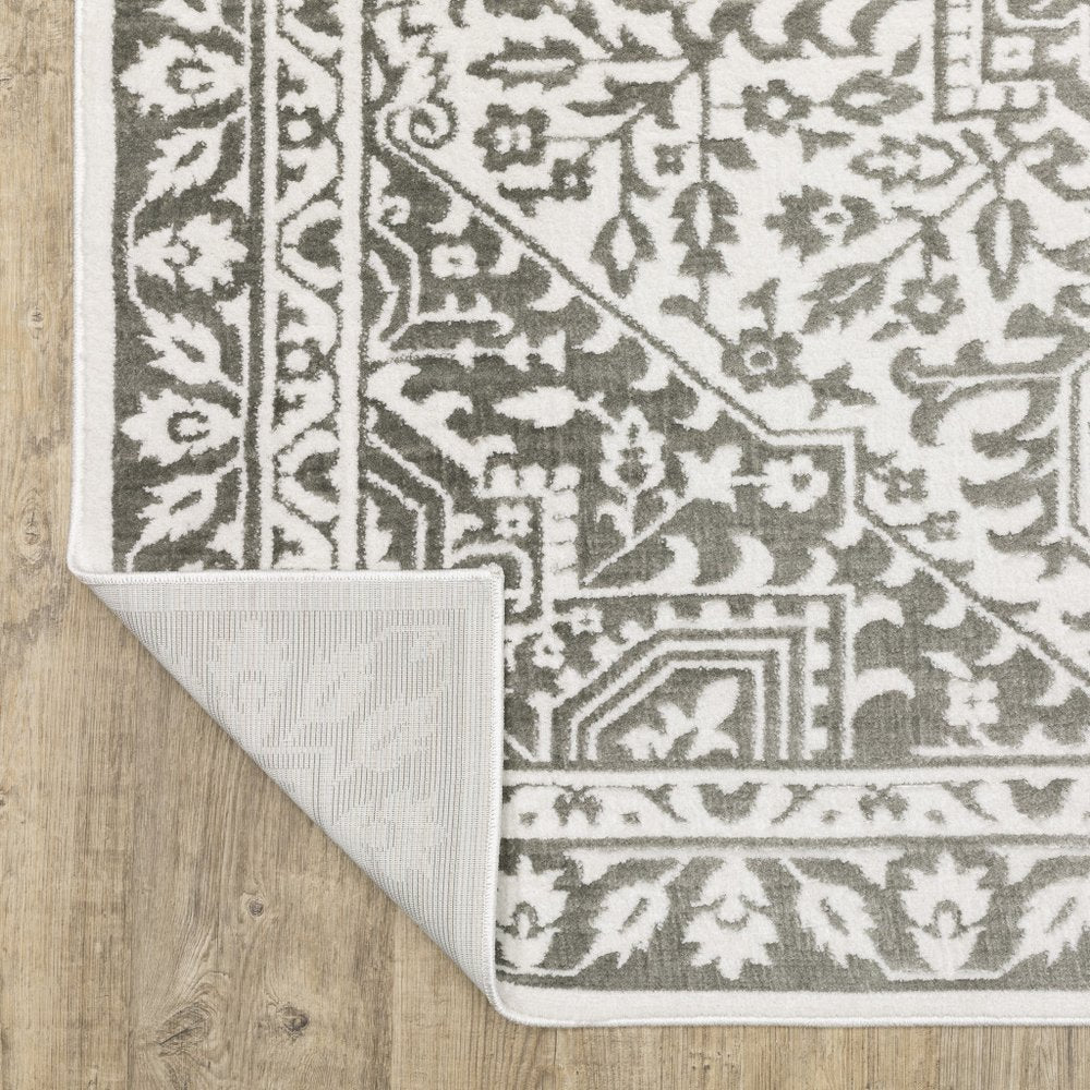 7' X 10' Gray And White Oriental Distressed Area Rug