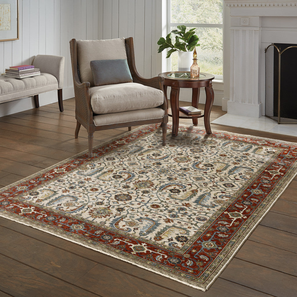 3' X 5' Ivory Red Green Grey Blue And Navy Oriental Power Loom Stain Resistant Area Rug With Fringe