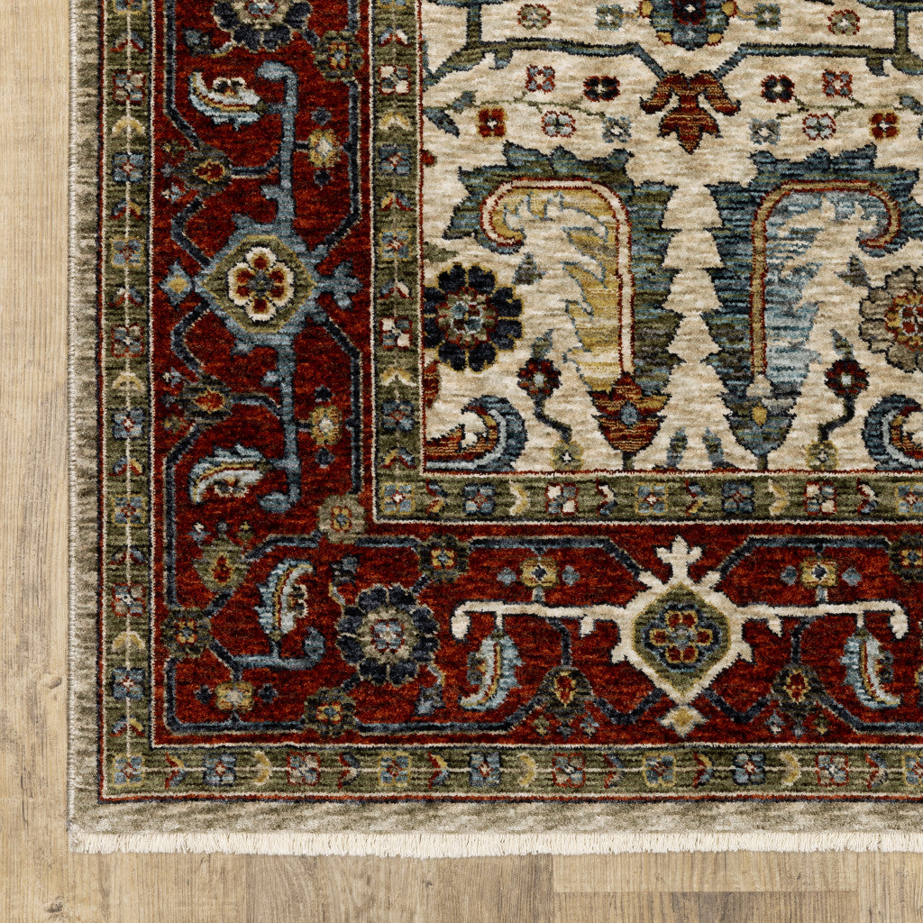 5' X 8' Ivory Red Green Grey Blue And Navy Oriental Power Loom Stain Resistant Area Rug With Fringe