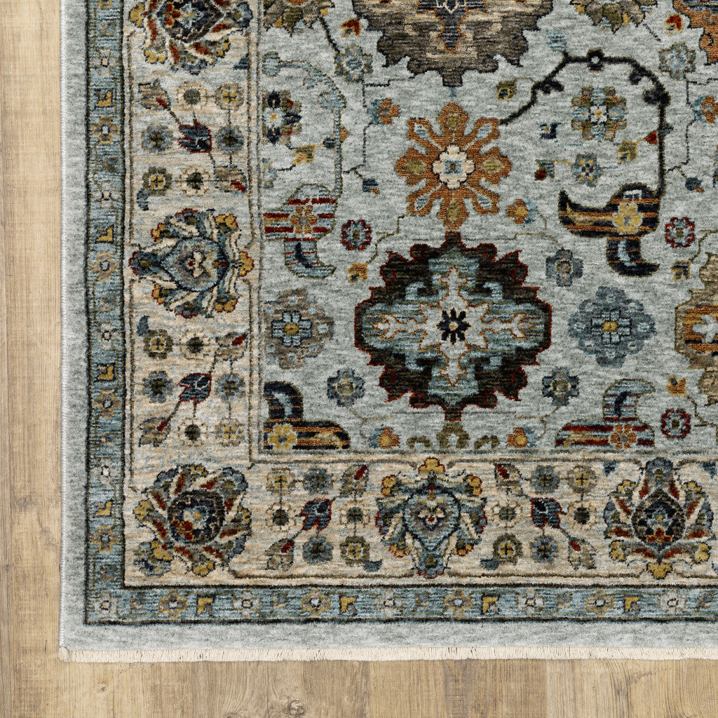 2' X 3' Blue Beige Grey Green Yellow And Rust Oriental Power Loom Stain Resistant Area Rug With Fringe