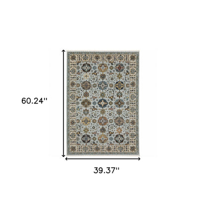 3' X 5' Blue Beige Grey Green Yellow And Rust Oriental Power Loom Stain Resistant Area Rug With Fringe