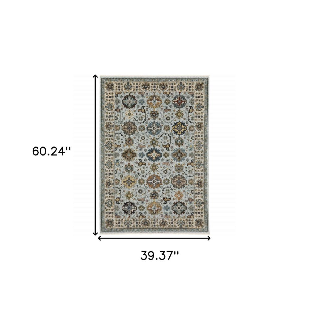 3' X 5' Blue Beige Grey Green Yellow And Rust Oriental Power Loom Stain Resistant Area Rug With Fringe