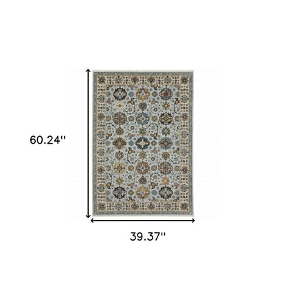 3' X 5' Blue Beige Grey Green Yellow And Rust Oriental Power Loom Stain Resistant Area Rug With Fringe